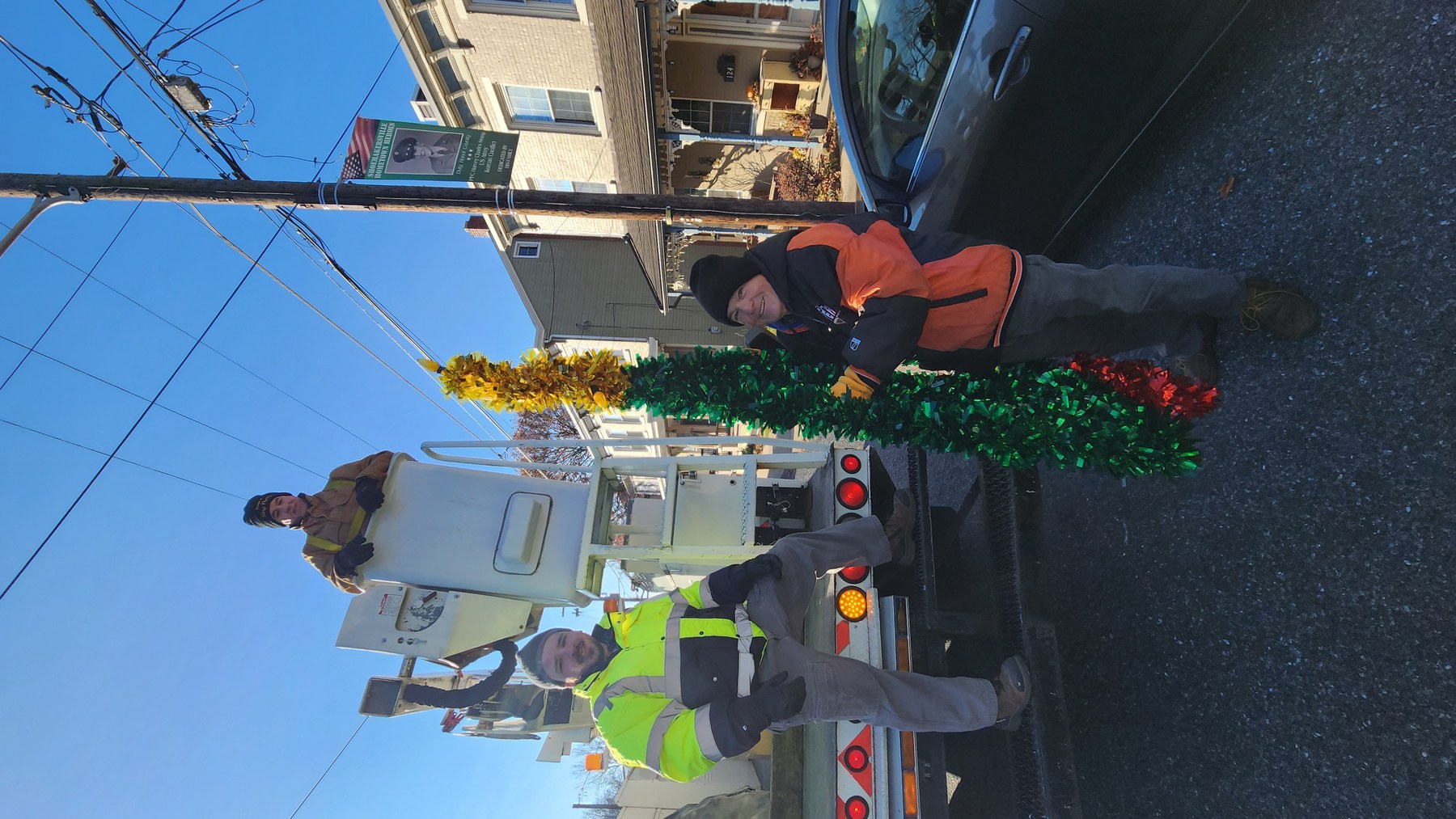 Community volunteers during Christmas lights installation